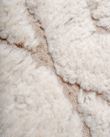 Modern, designer, handcrafted Berber rug from Morocco. Beniourain carpet with minimalist design, natural wool pile and a fluffy texture.