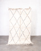 Modern, designer, handcrafted Berber rug from Morocco. Beniourain carpet with beautiful colours and patterns and fluffy wool texture.