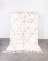 Modern, designer, handcrafted Berber rug from Morocco. Beniourain carpet with beautiful colours and patterns and fluffy wool texture.