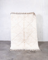 Modern, designer, handcrafted Berber rug from Morocco. Beniourain carpet with beautiful colours and patterns and fluffy wool texture.