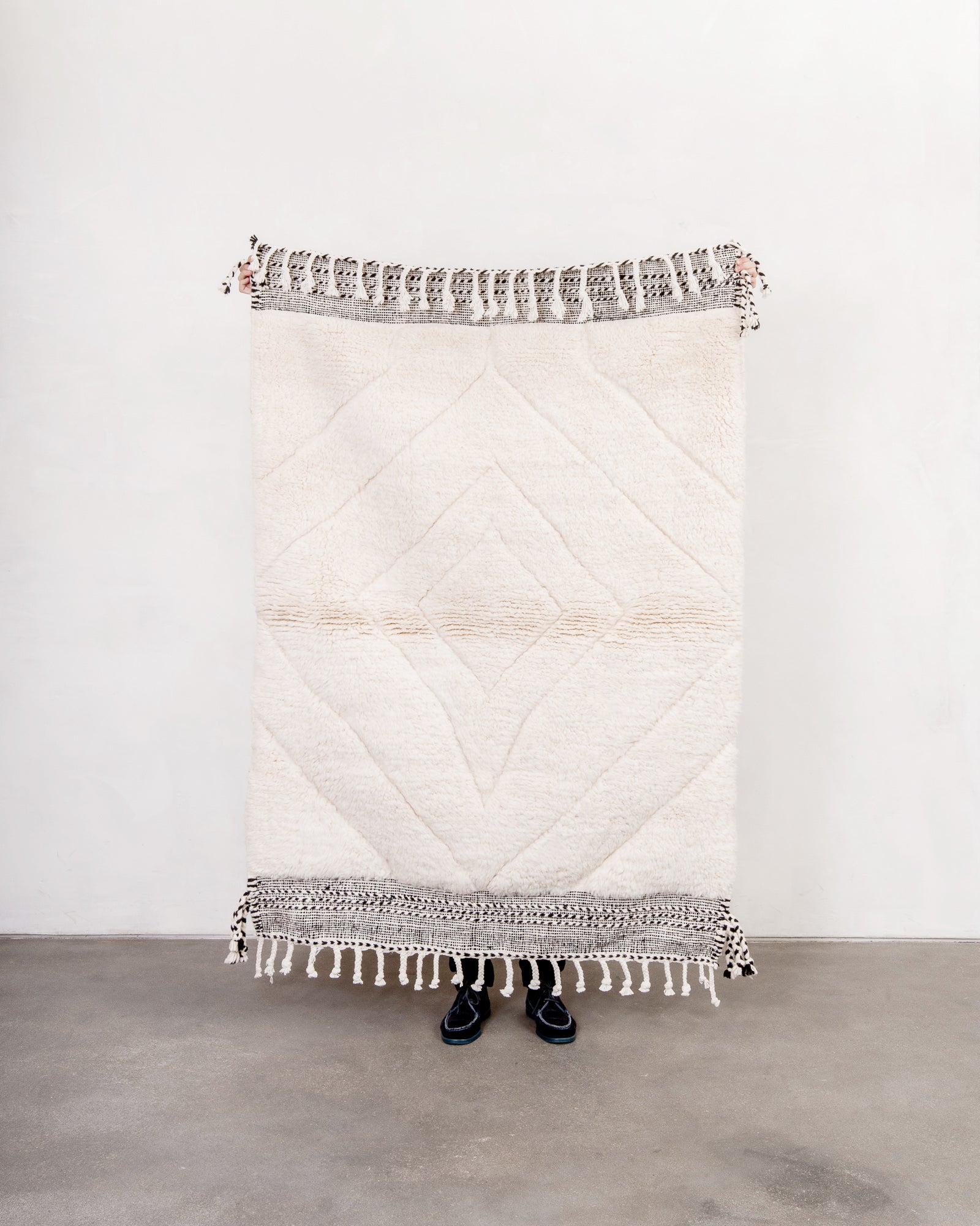 Modern, designer, handcrafted Berber rug from Morocco. Beniourain carpet with beautiful colours and patterns and fluffy wool texture.