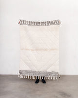 Modern, designer, handcrafted Berber rug from Morocco. Beniourain carpet with beautiful colours and patterns and fluffy wool texture.