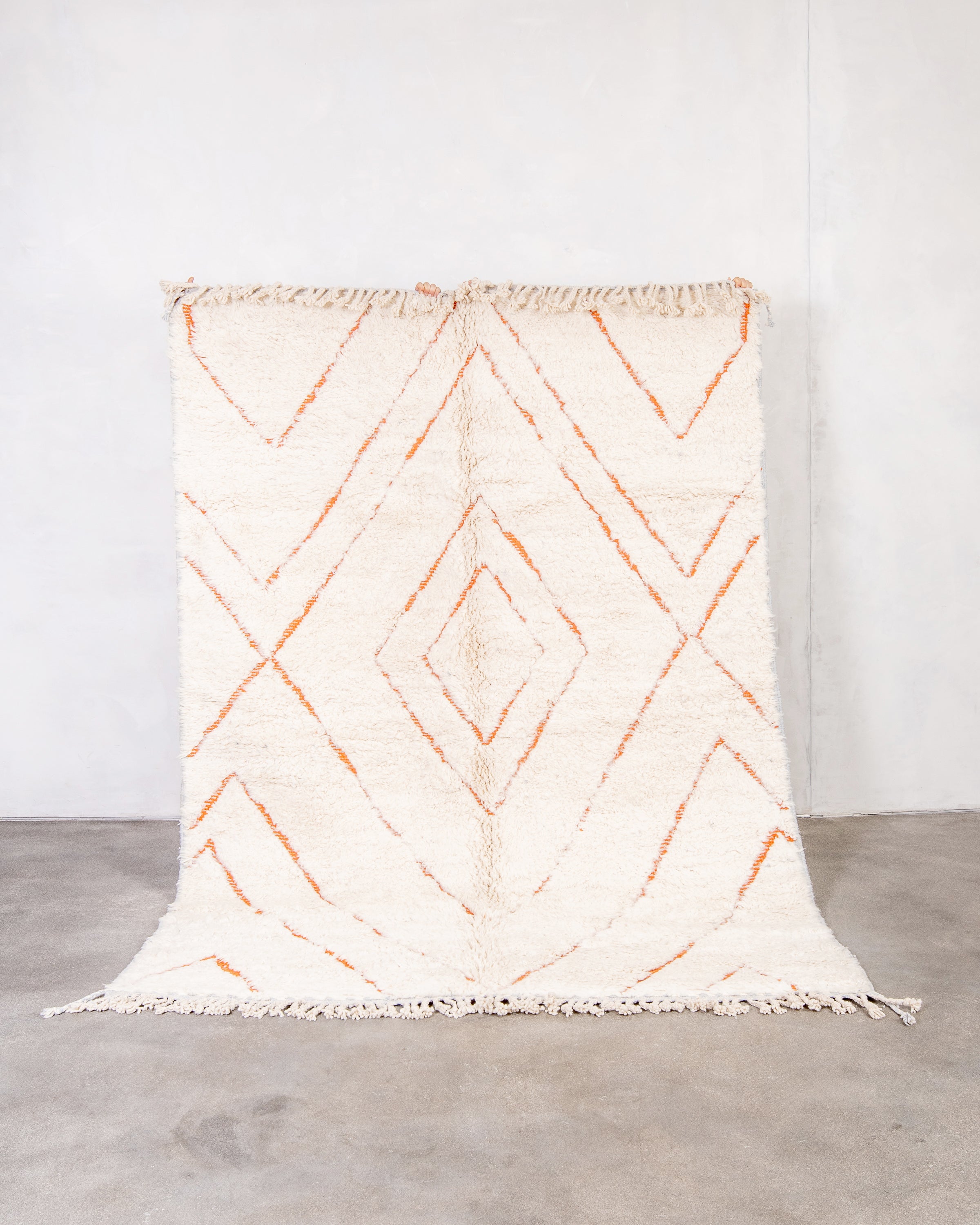 Modern, designer, handcrafted Berber rug from Morocco. Beniourain carpet with beautiful colors and patterns and fluffy wool texture.