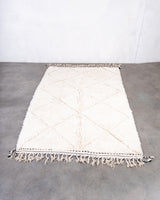 Modern, designer, handcrafted Berber rug from Morocco. Beniourain carpet with beautiful colours and patterns and fluffy wool texture.