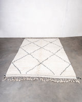 Modern, designer, handcrafted Berber rug from Morocco. Beniourain carpet with beautiful colours and patterns and fluffy wool texture.
