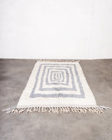 Modern, designer, handcrafted Berber rug from Morocco. Beniourain carpet with beautiful colors and patterns and fluffy wool texture.