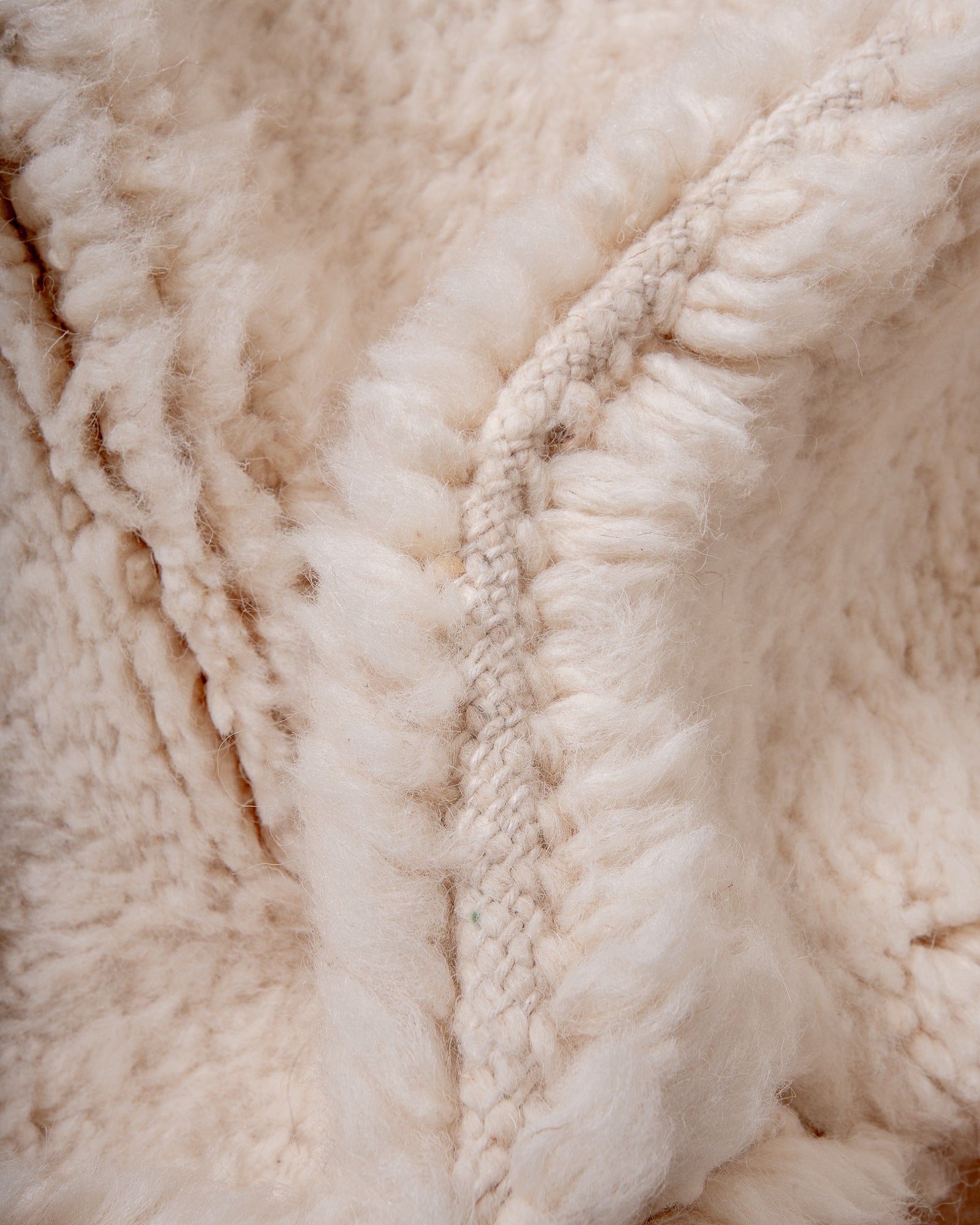 Modern, designer, handcrafted Berber rug from Morocco. Beniourain carpet with beautiful colours and patterns and fluffy wool texture.