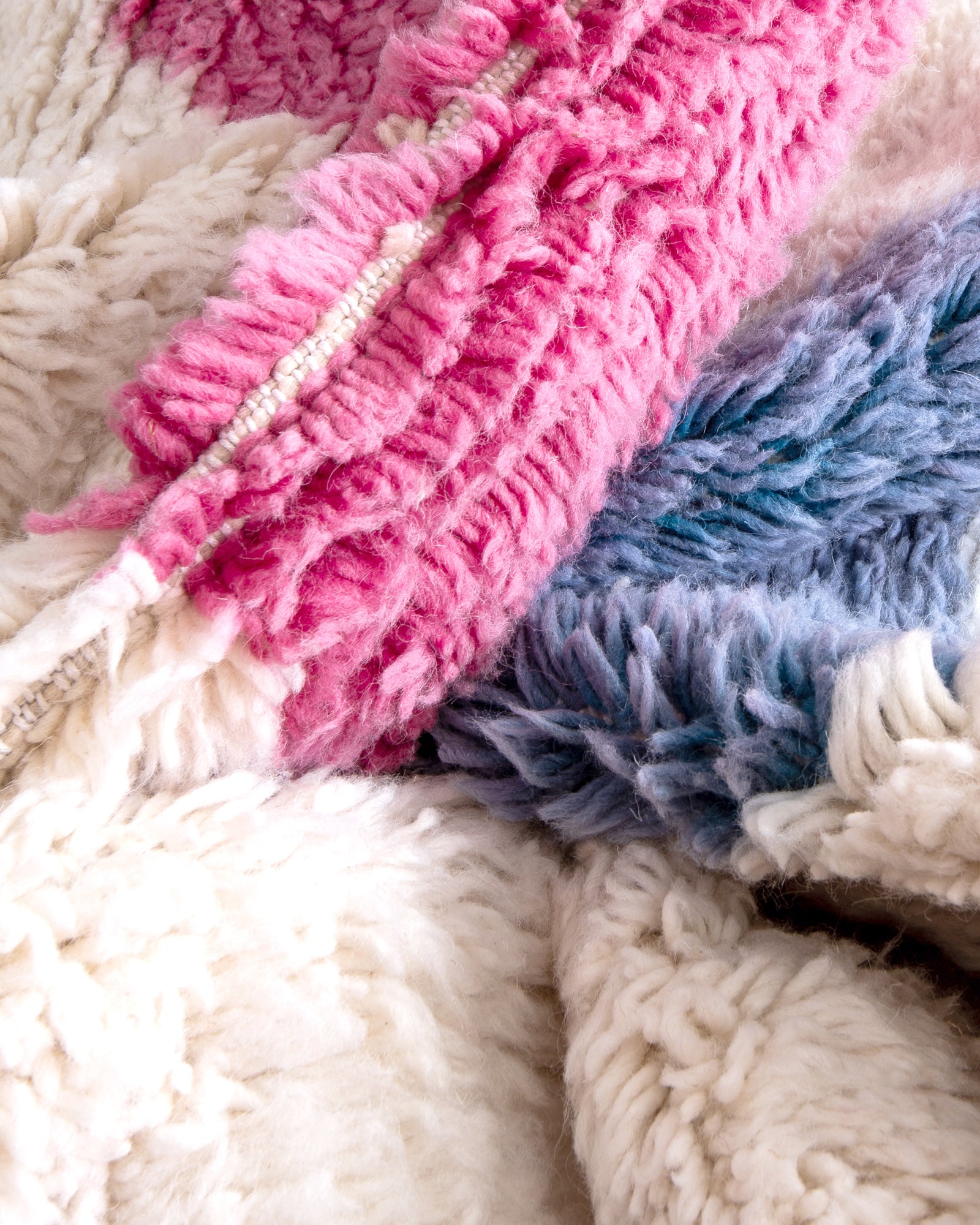 Modern, designer, handcrafted Berber rug from Morocco. Beniourain carpet with beautiful colors and patterns and fluffy wool texture.