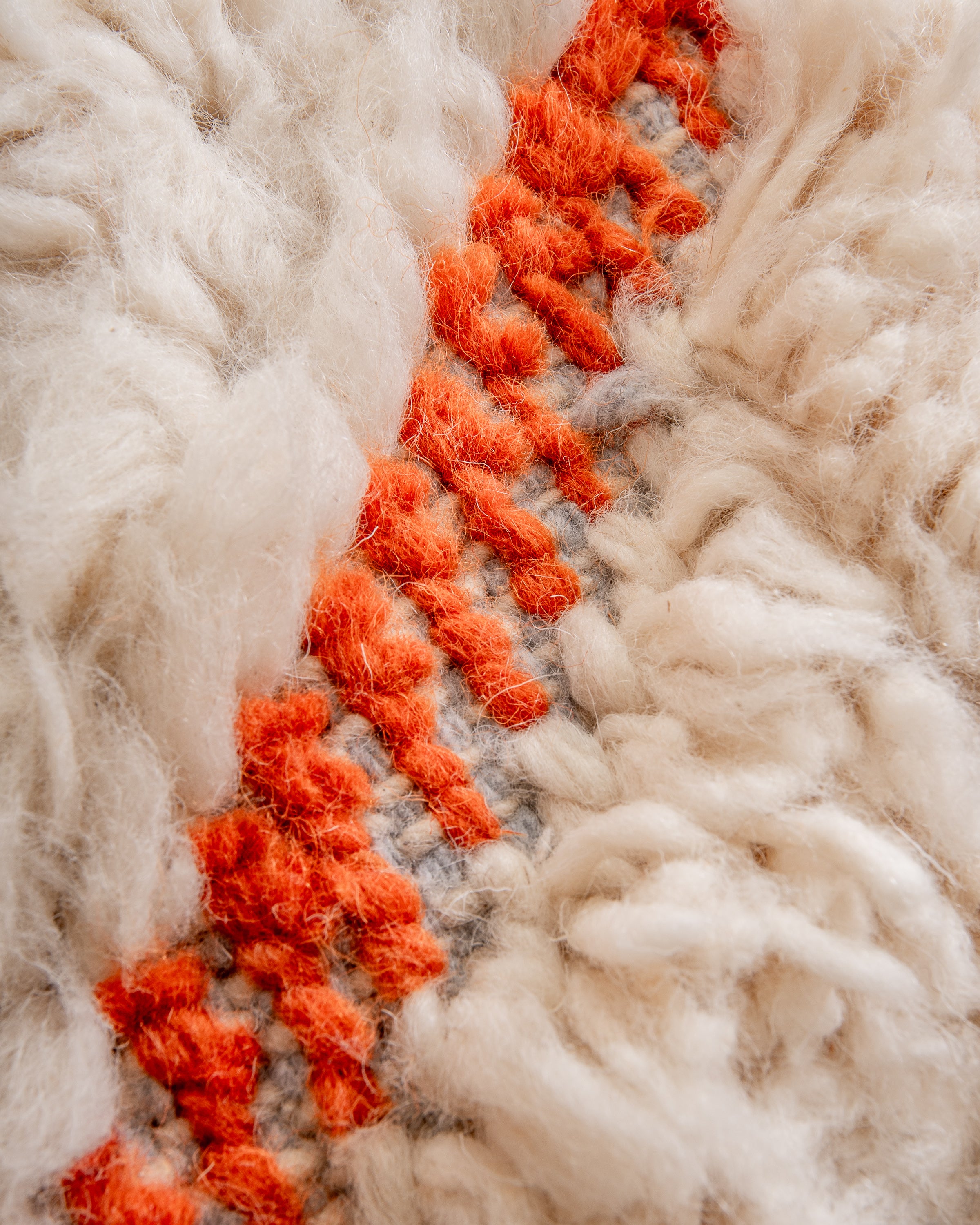 Modern, designer, handcrafted Berber rug from Morocco. Beniourain carpet with beautiful colors and patterns and fluffy wool texture.