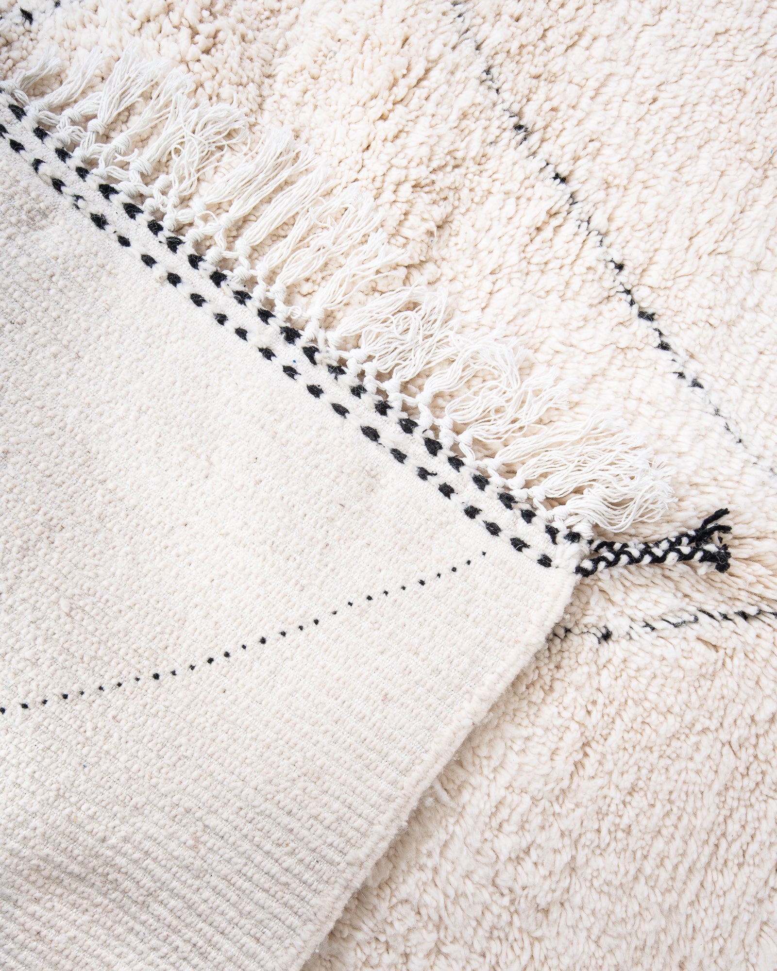 Modern, designer, handcrafted Berber rug from Morocco. Beniourain carpet with beautiful colours and patterns and fluffy wool texture.