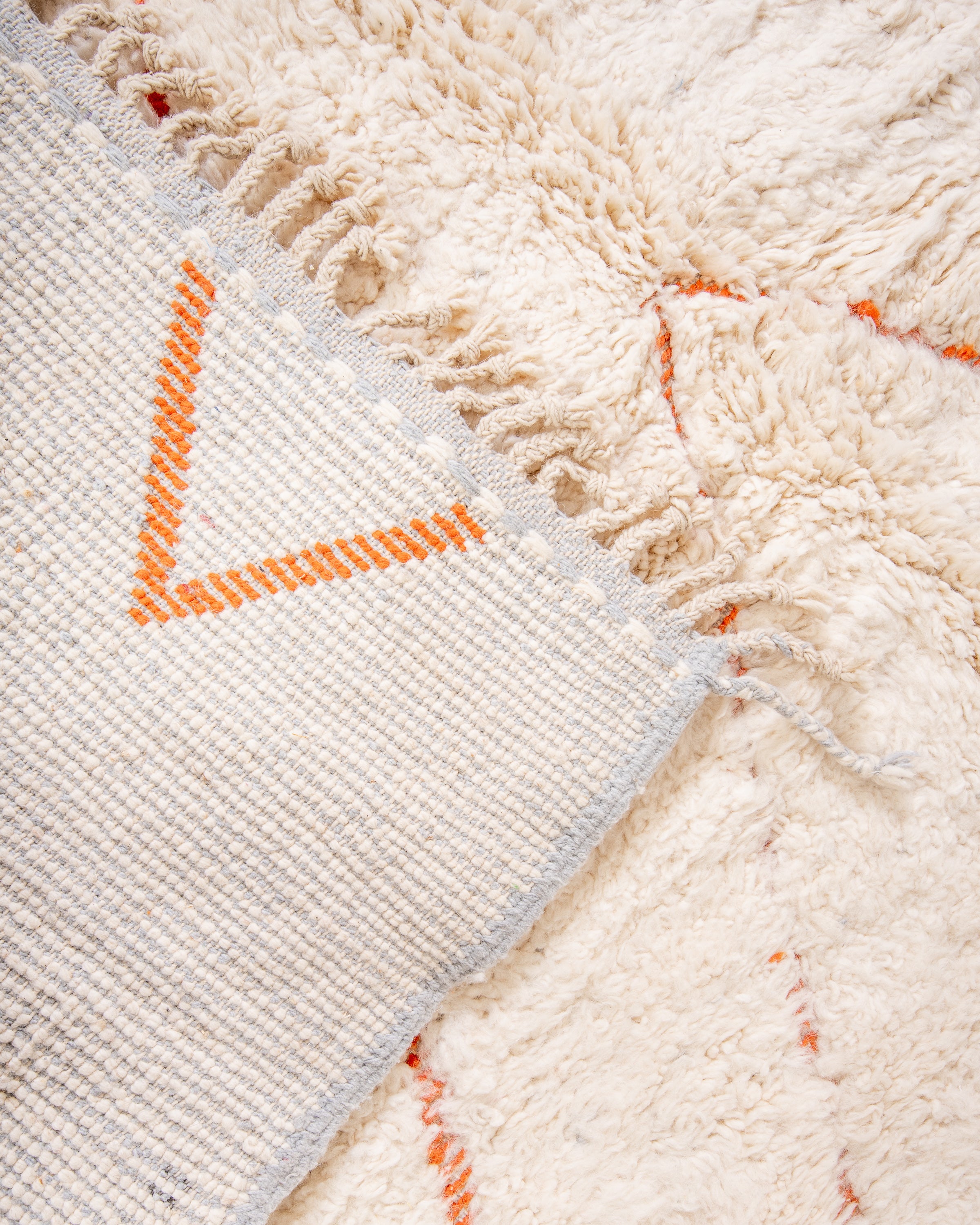 Modern, designer, handcrafted Berber rug from Morocco. Beniourain carpet with beautiful colors and patterns and fluffy wool texture.