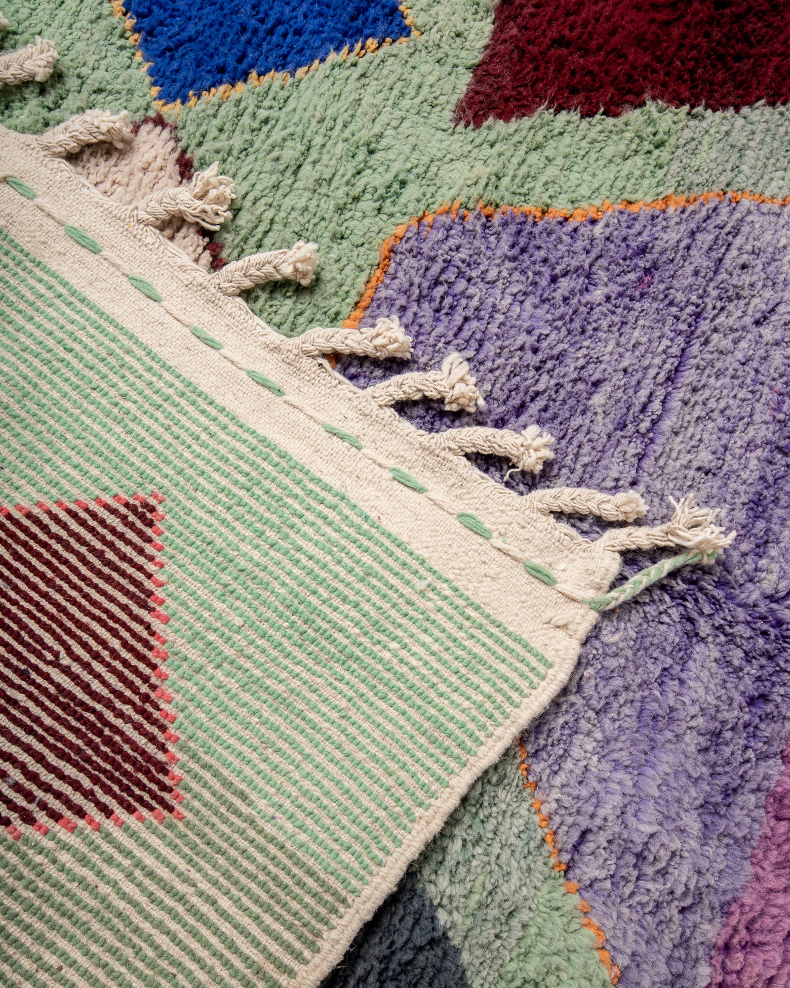 Modern, designer, handcrafted Berber rug from Morocco. Vintage carpet with beautiful colours and patterns and fluffy texture.