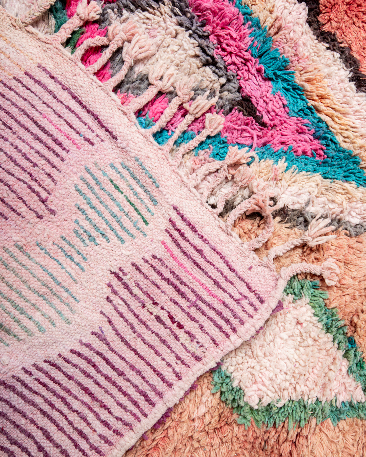 Modern, designer, handcrafted Berber rug from Morocco. Vintage carpet with beautiful colours and patterns and fluffy texture.