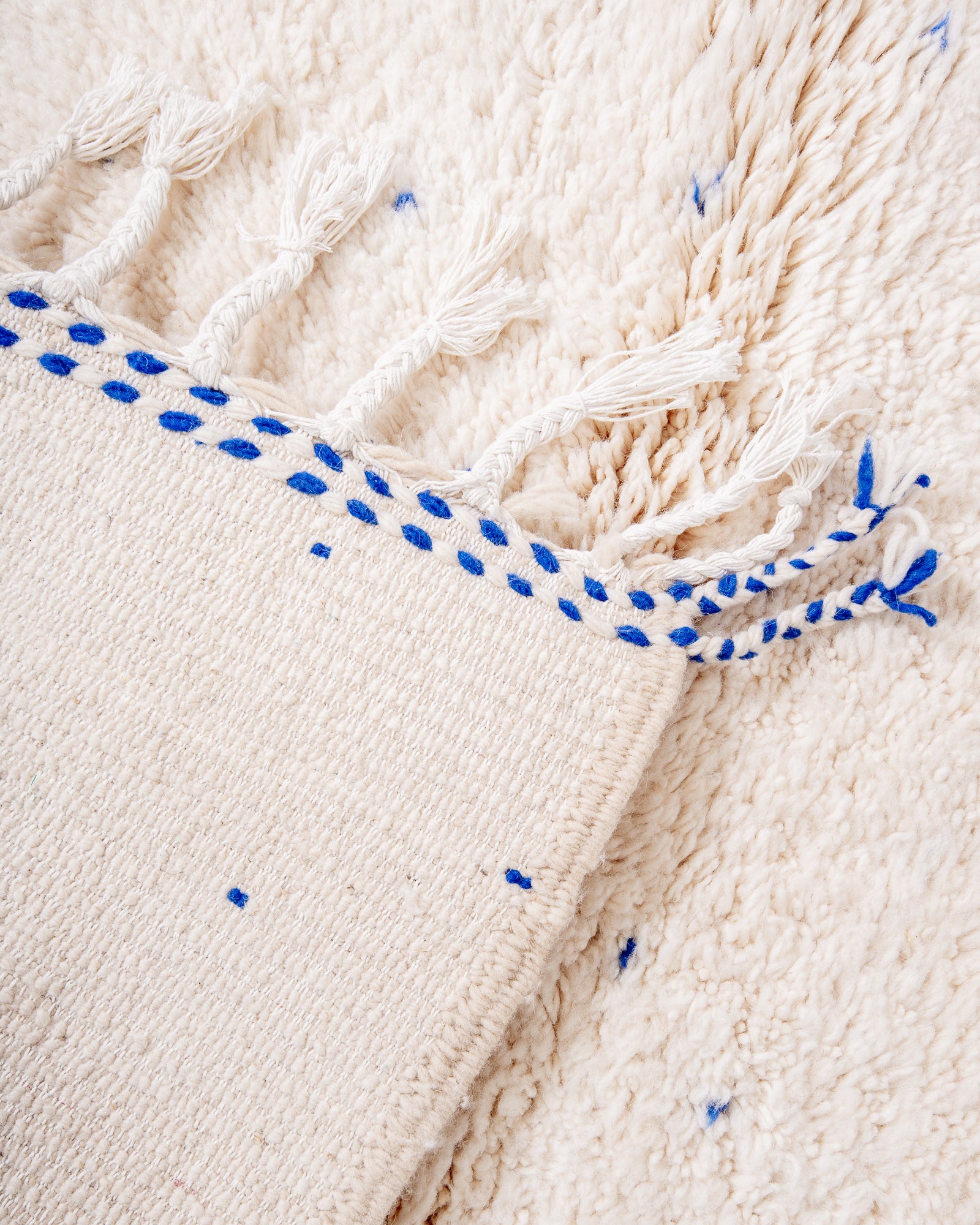 Modern, designer, handcrafted Berber rug from Morocco. Beniourain carpet with beautiful colours and patterns and fluffy wool texture.