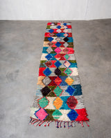 Modern designer vintage handcrafted cotton Berber rug from Morocco. Boucherouite with beautiful colors and patterns.