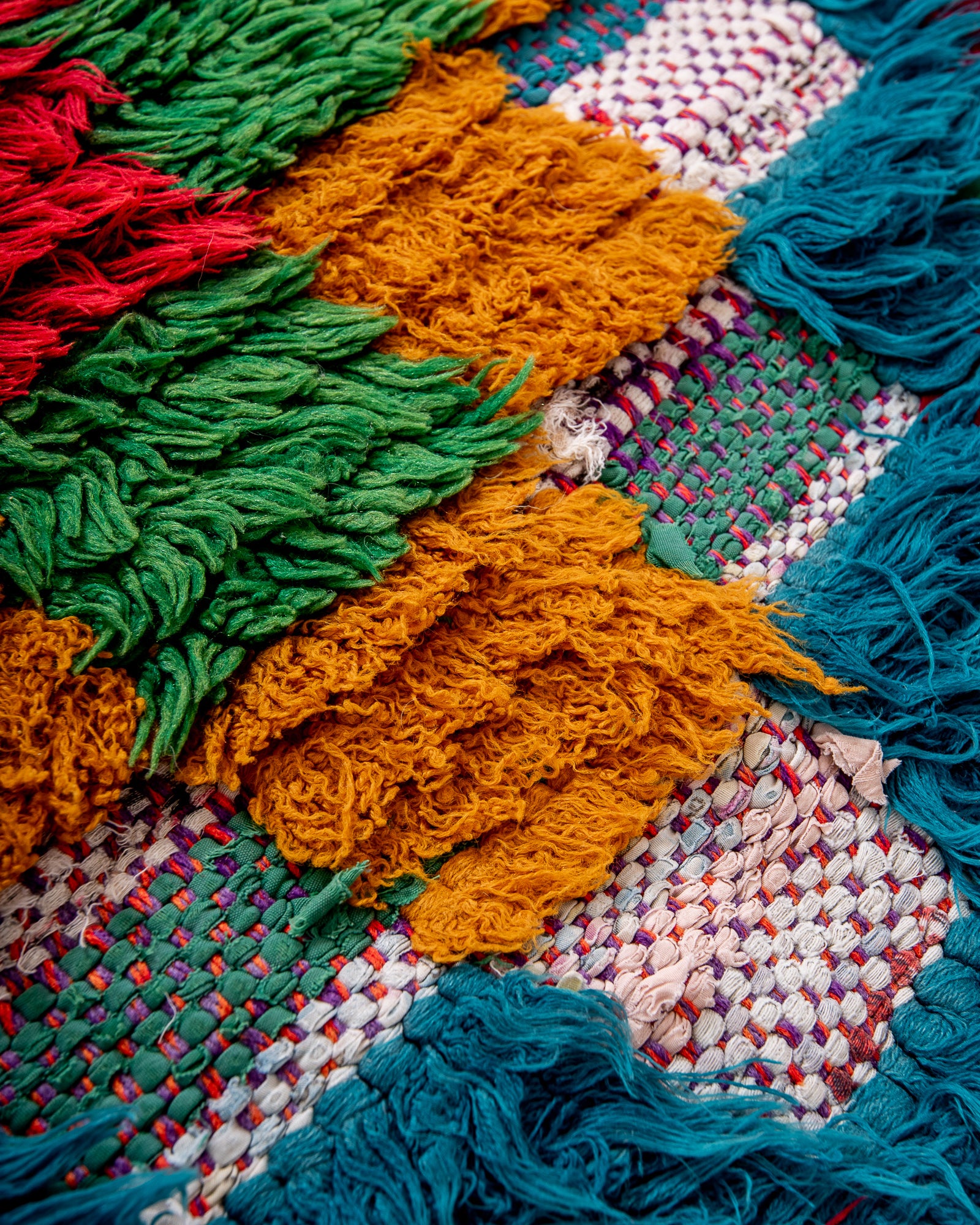 Modern designer handcrafted cotton Berber rug from Morocco. Boucherouite with beautiful colors and patterns.