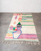 Modern, designer, handcrafted Berber rug from Morocco. Vintage carpet with beautiful colours and patterns and fluffy texture.
