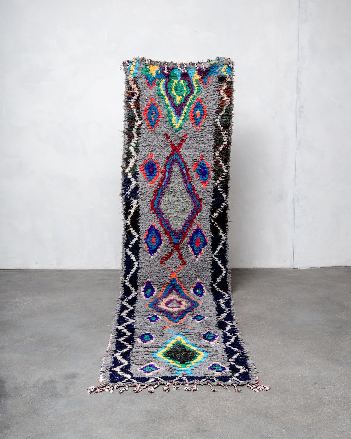 Modern designer vintage handcrafted cotton Berber rug from Morocco. Boucherouite with beautiful colors and patterns.