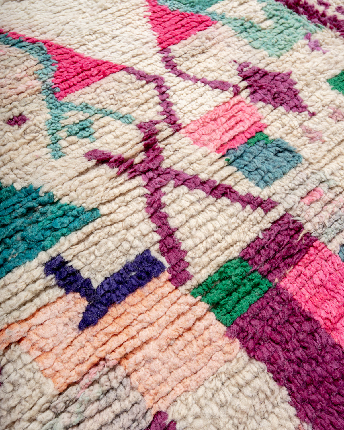 Modern, designer, handcrafted Berber rug from Morocco. Vintage carpet with beautiful colours and patterns and fluffy texture.