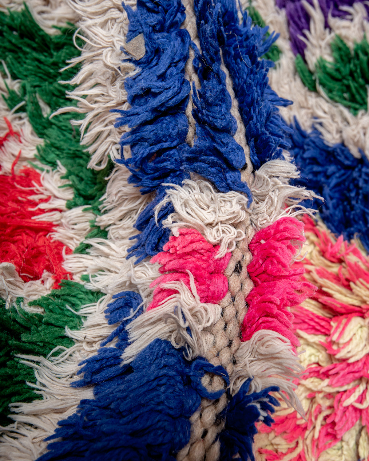 Modern designer vintage handcrafted Berber rug from Morocco. Boucherouite with beautiful colors and patterns.