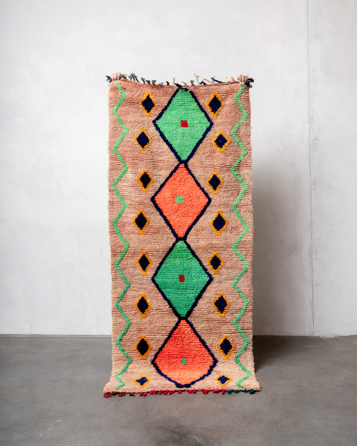 Modern designer vintage handcrafted Berber rug from Morocco. Boucherouite with beautiful colors and patterns.