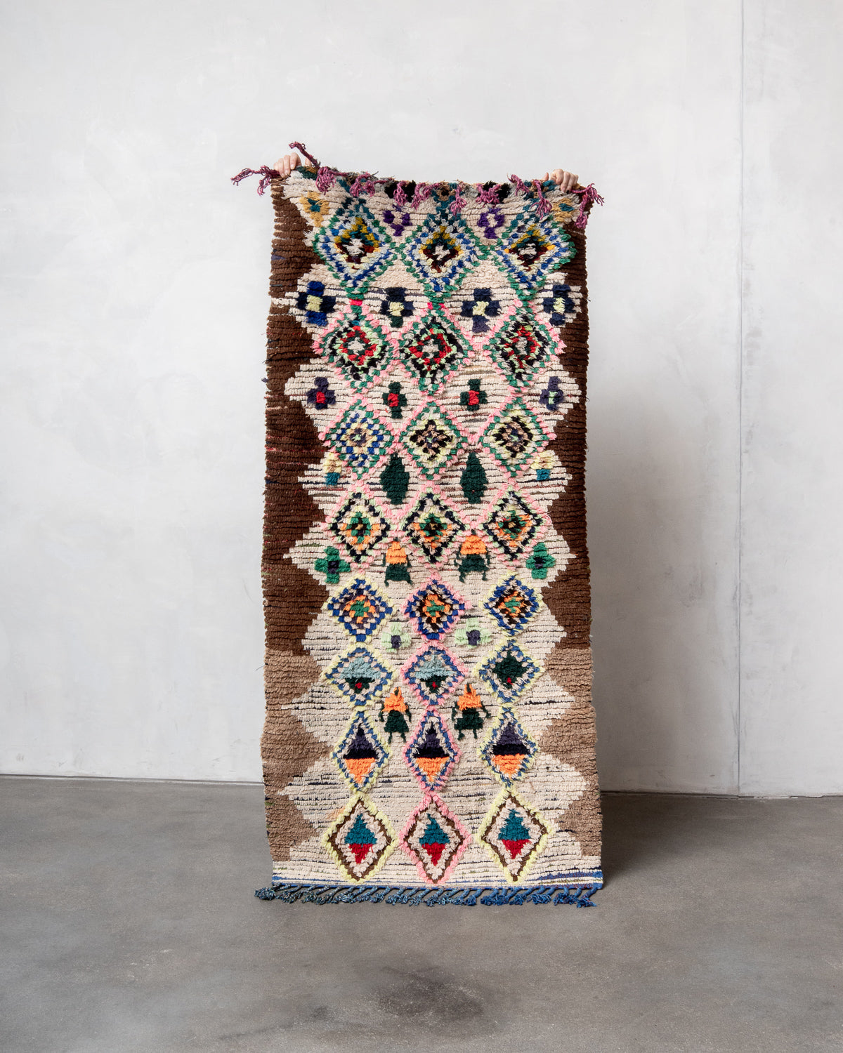 Modern designer vintage handcrafted Berber rug from Morocco. Boucherouite with beautiful colors and patterns.