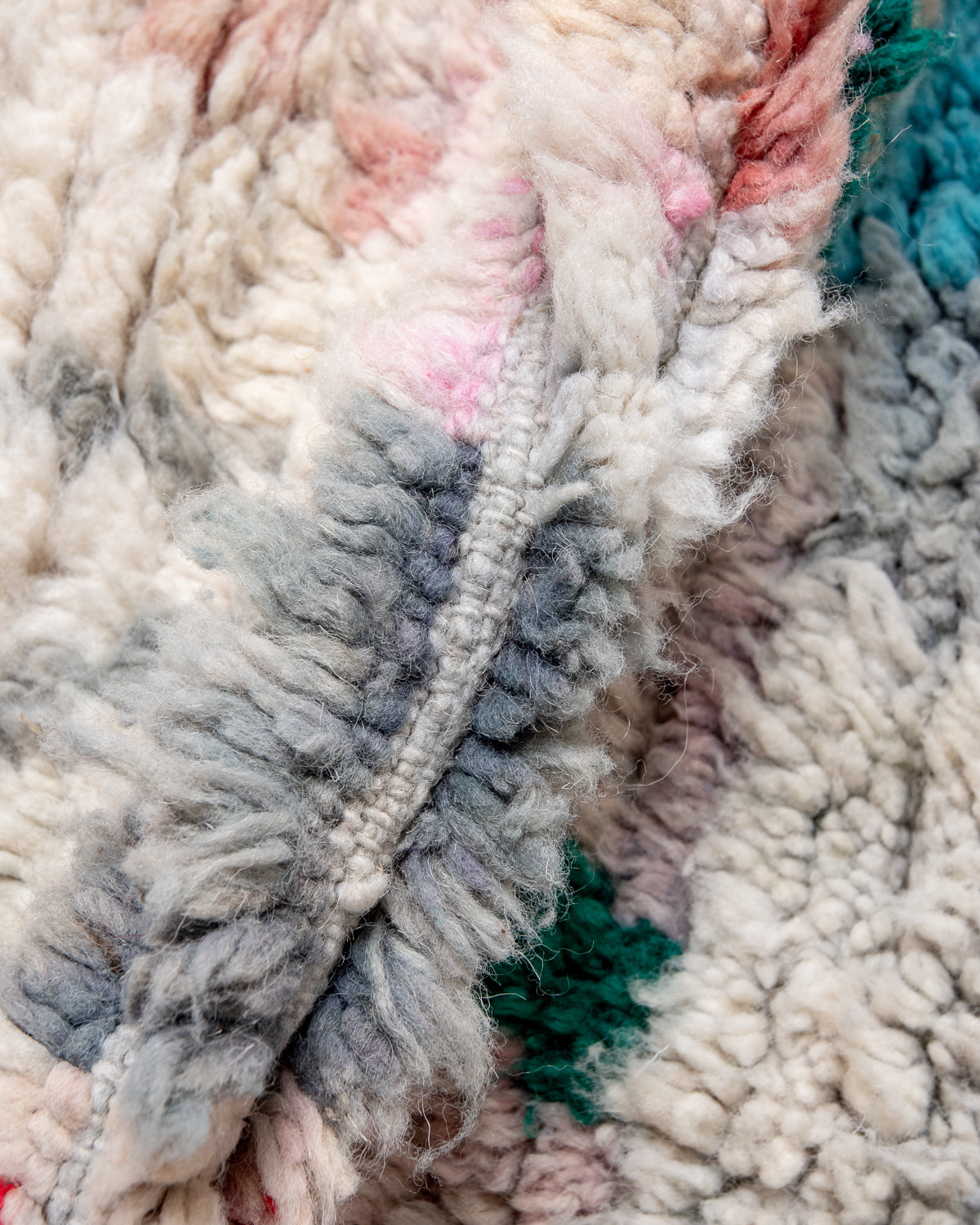 Modern, designer, handcrafted Berber rug from Morocco. Vintage carpet with beautiful colours and patterns and fluffy texture.