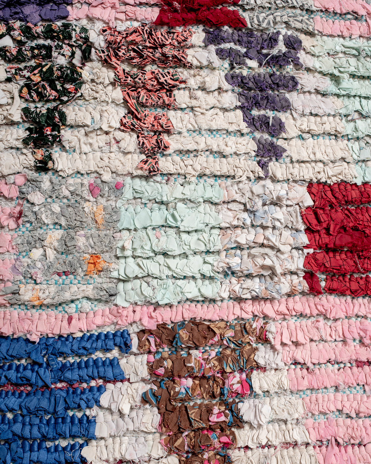 Modern designer vintage handcrafted Berber rug from Morocco. Boucherouite runner rug with beautiful colors and patterns.