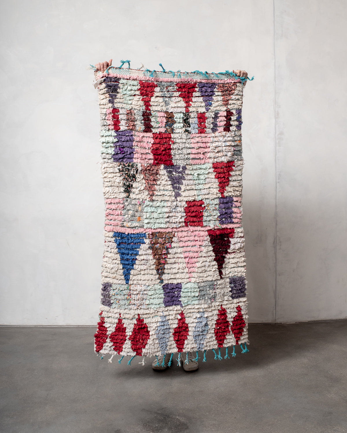 Modern designer vintage handcrafted Berber rug from Morocco. Boucherouite runner rug with beautiful colors and patterns.