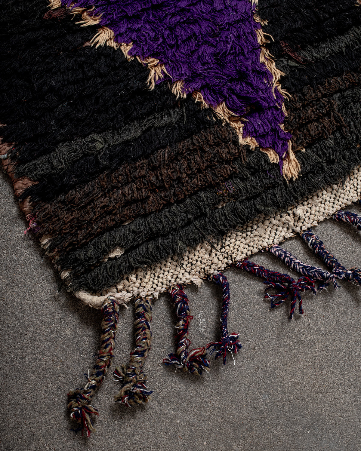 Modern designer vintage handcrafted Berber rug from Morocco. Boucherouite runner rug with beautiful colors and patterns.