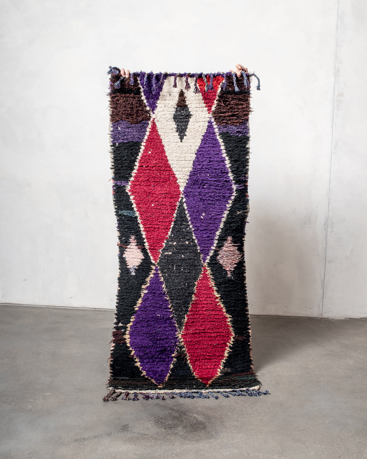Modern designer vintage handcrafted Berber rug from Morocco. Boucherouite runner rug with beautiful colors and patterns.