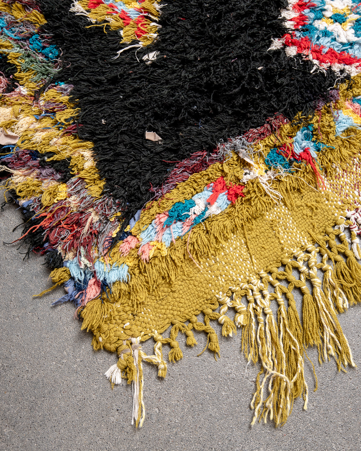 Modern designer vintage handcrafted Berber rug from Morocco. Boucherouite runner rug with beautiful colors and patterns.