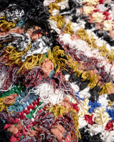 Modern designer vintage handcrafted Berber rug from Morocco. Boucherouite runner rug with beautiful colors and patterns.
