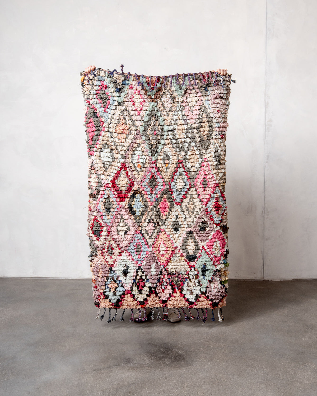 Modern designer vintage handcrafted Berber rug from Morocco. Boucherouite with beautiful colors and patterns.