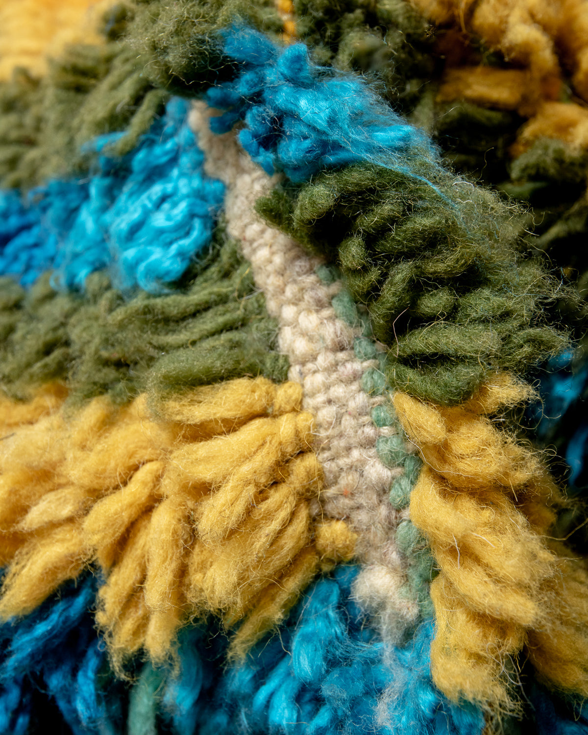 Modern, designer, handcrafted Berber rug from Morocco. Vintage carpet with beautiful colours and patterns and fluffy texture.