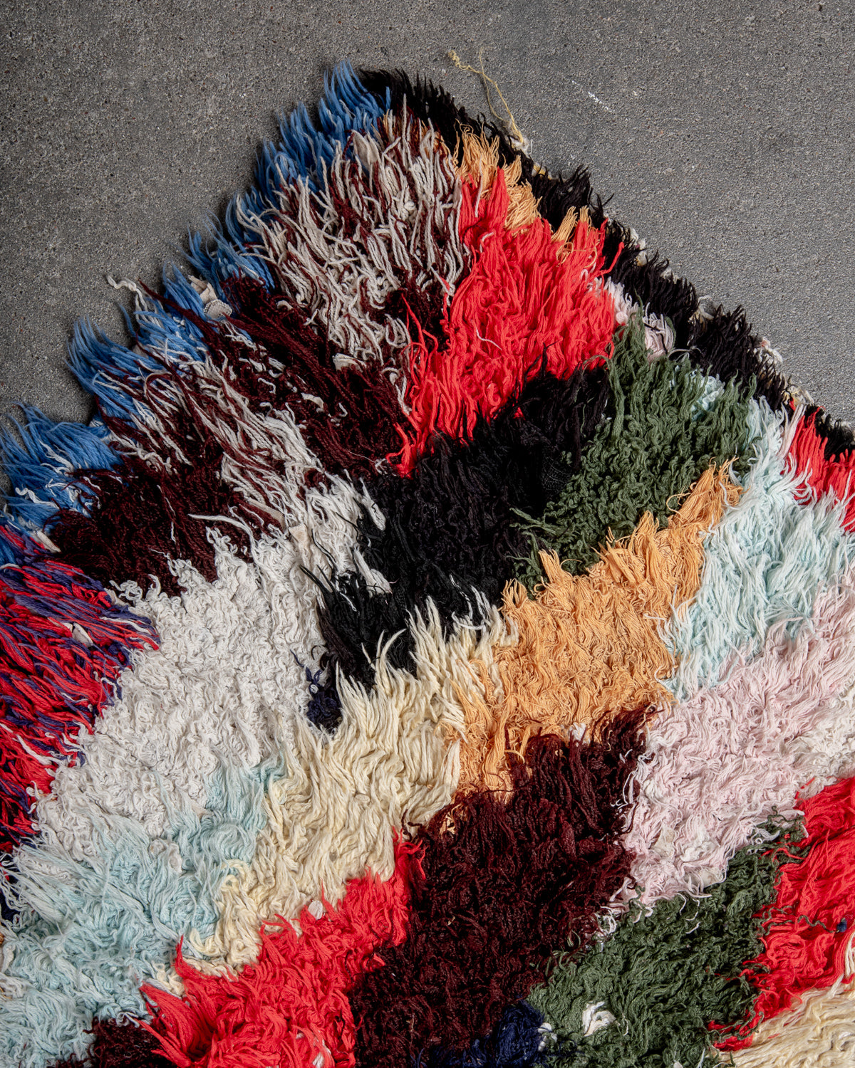 Modern designer vintage handcrafted Berber rug from Morocco. Boucherouite with beautiful colors and patterns.