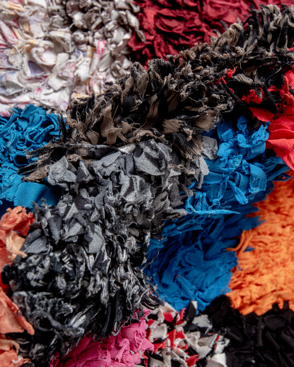 Modern designer vintage handcrafted Berber rug from Morocco. Boucherouite with beautiful colors and patterns.