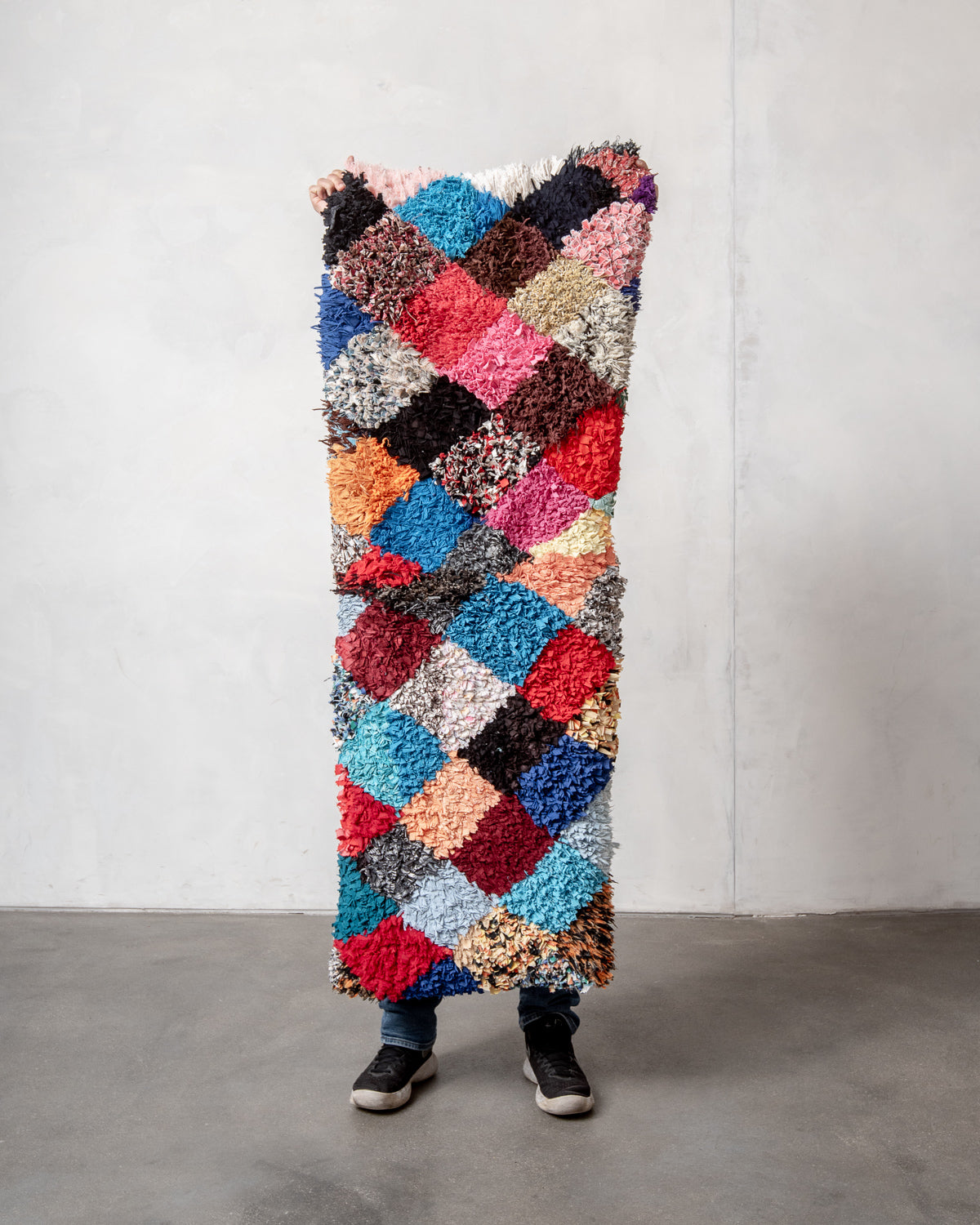 Modern designer vintage handcrafted Berber rug from Morocco. Boucherouite with beautiful colors and patterns.