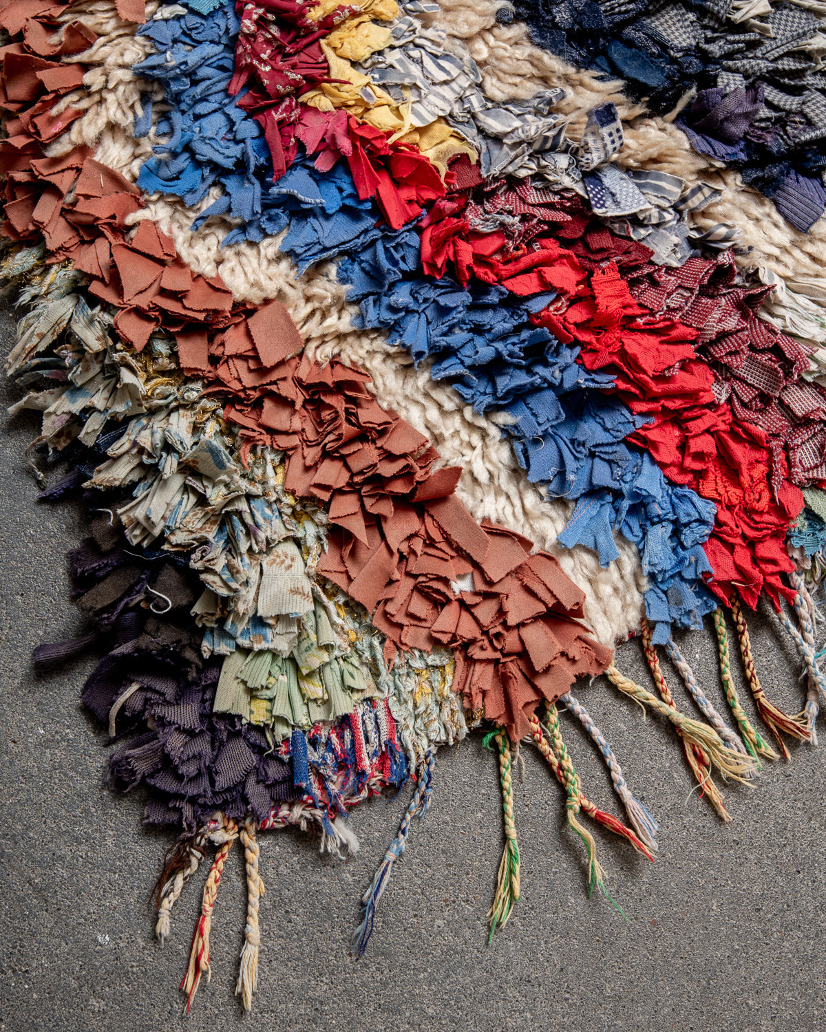 Modern designer vintage handcrafted Berber rug from Morocco. Boucherouite with beautiful colors and patterns.