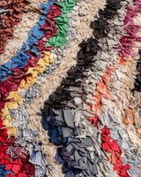 Modern designer vintage handcrafted Berber rug from Morocco. Boucherouite with beautiful colors and patterns.