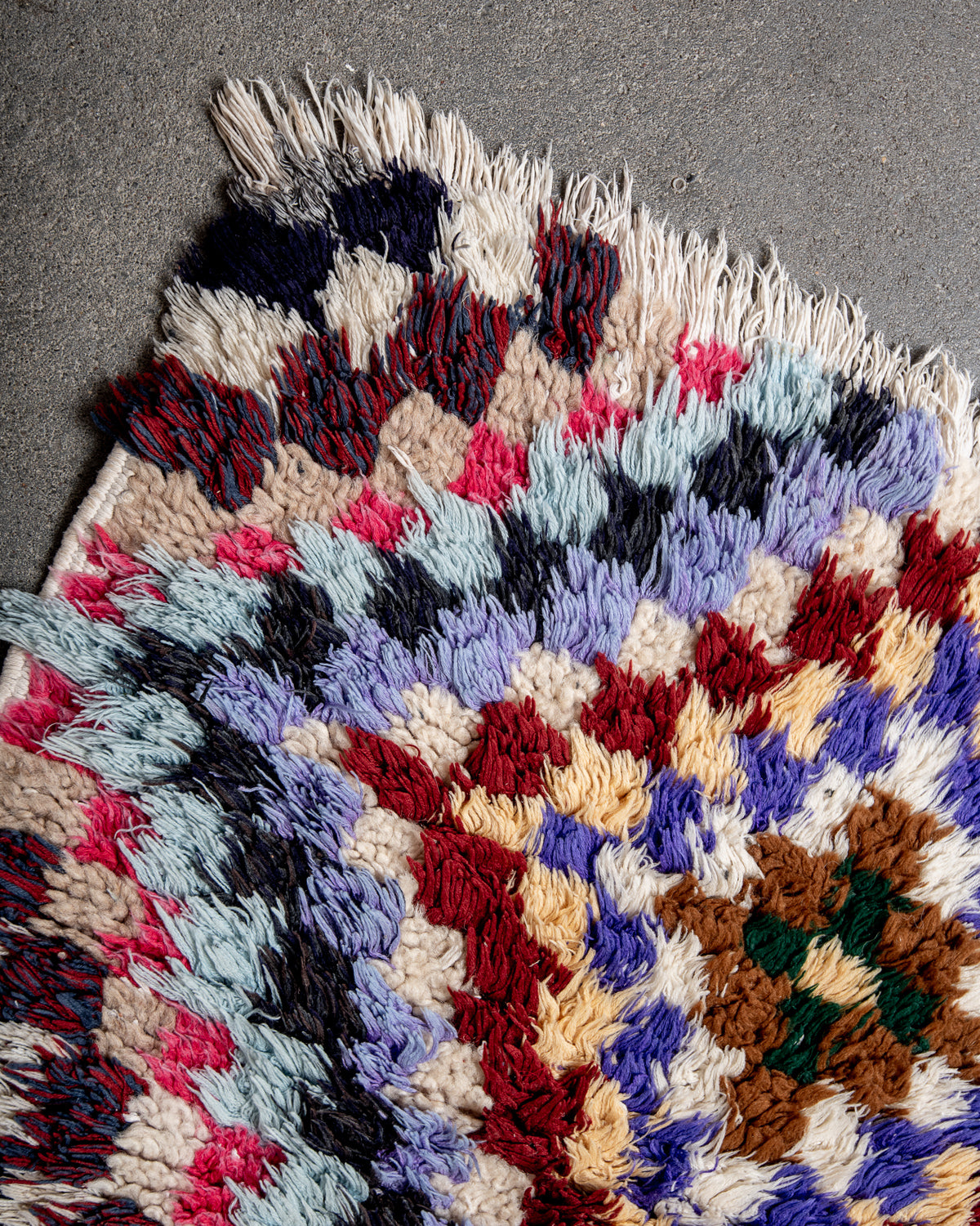 Modern designer vintage handcrafted Berber rug from Morocco. Boucherouite with beautiful colors and patterns.