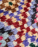 Modern designer vintage handcrafted Berber rug from Morocco. Boucherouite with beautiful colors and patterns.