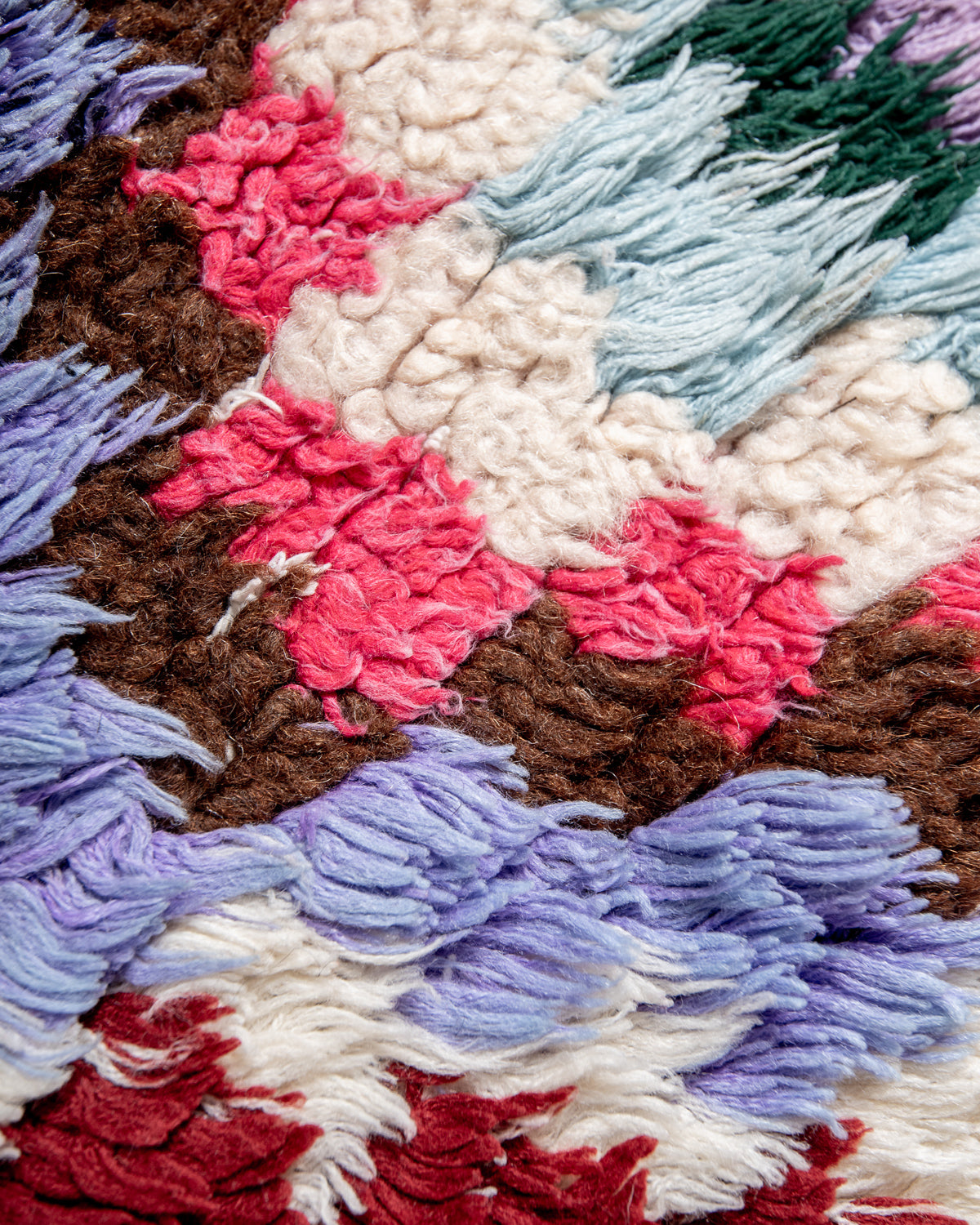 Modern designer vintage handcrafted Berber rug from Morocco. Boucherouite with beautiful colors and patterns.