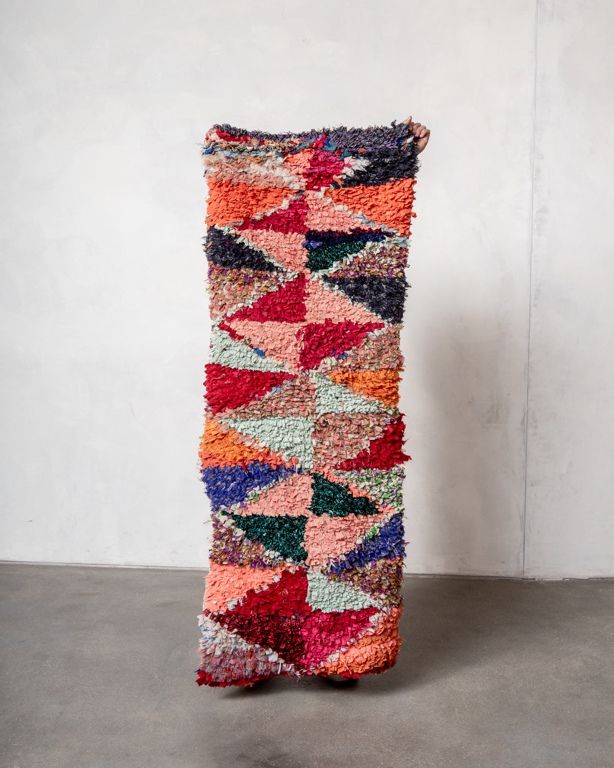 Modern designer vintage handcrafted Berber rug from Morocco. Boucherouite with beautiful colors and patterns.