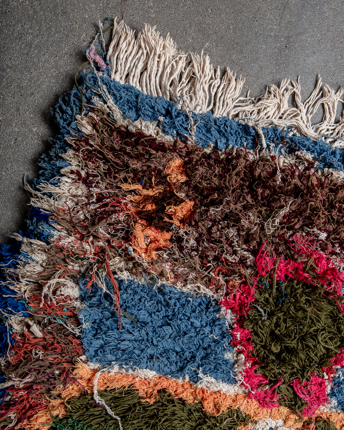 Modern designer vintage handcrafted Berber rug from Morocco. Boucherouite with beautiful colors and patterns.