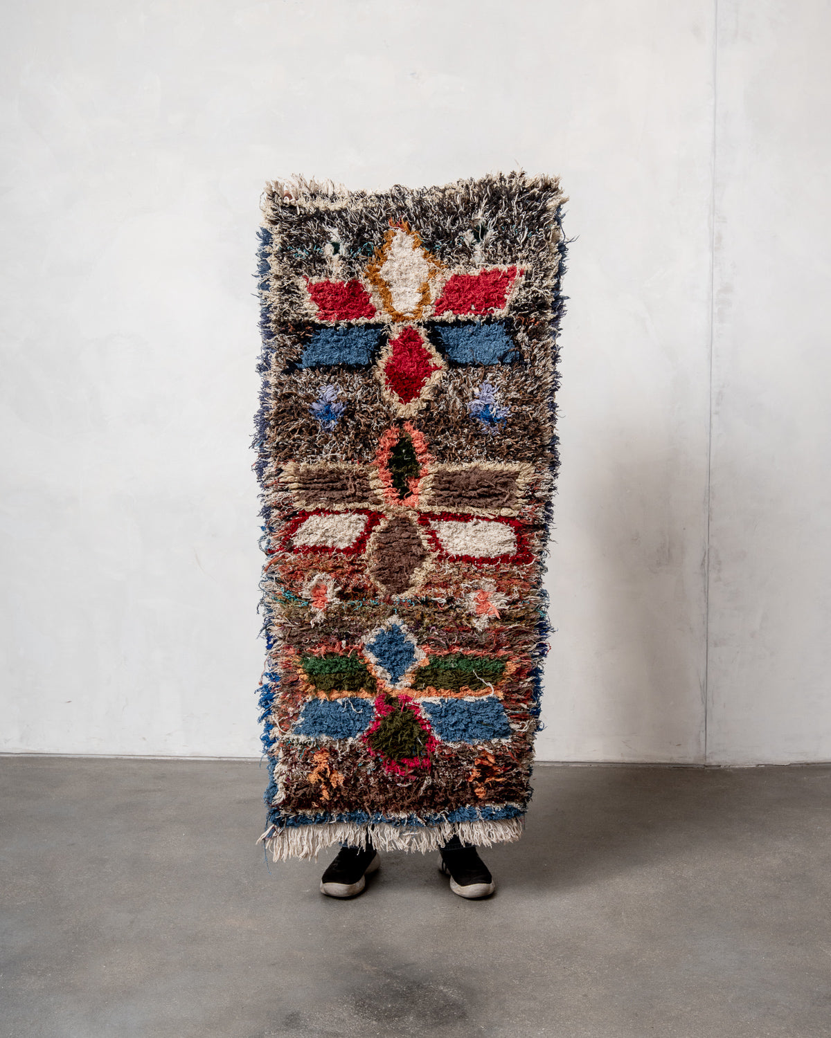 Modern designer vintage handcrafted Berber rug from Morocco. Boucherouite with beautiful colors and patterns.
