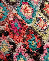 Modern designer vintage handcrafted Berber rug from Morocco. Boucherouite with beautiful colors and patterns.