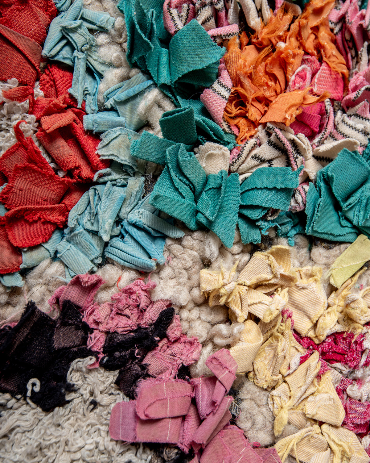 Modern designer vintage handcrafted Berber rug from Morocco. Boucherouite with beautiful colors and patterns.