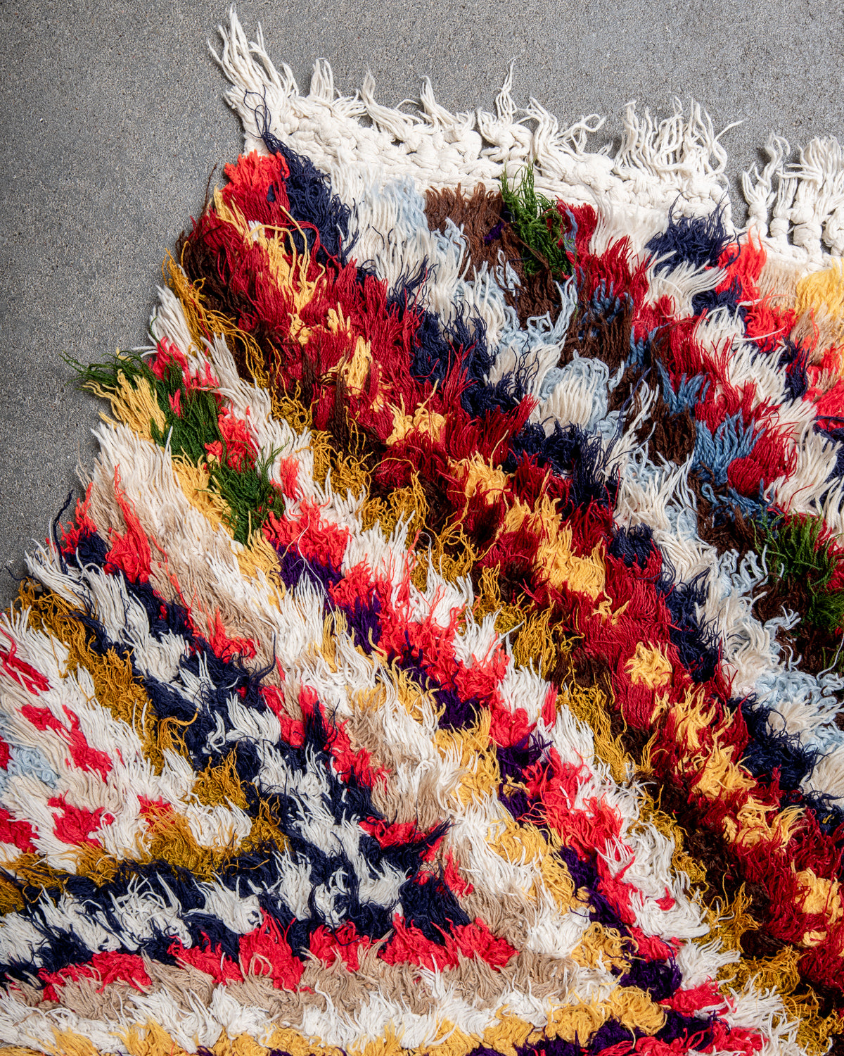 Modern designer vintage handcrafted Berber rug from Morocco. Boucherouite runner rug with beautiful colors and patterns.