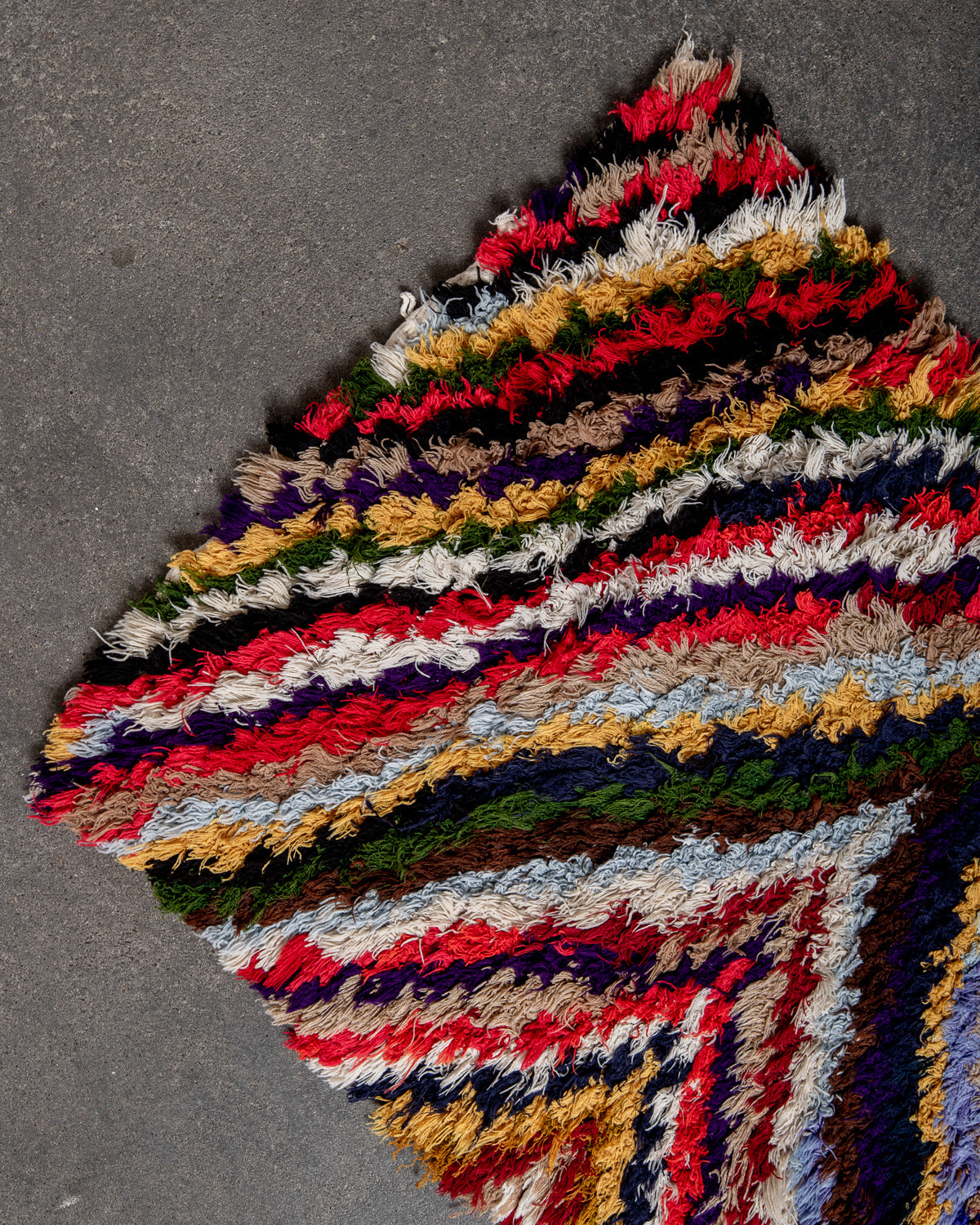 Modern designer vintage handcrafted Berber rug from Morocco. Boucherouite runner rug with beautiful colors and patterns.